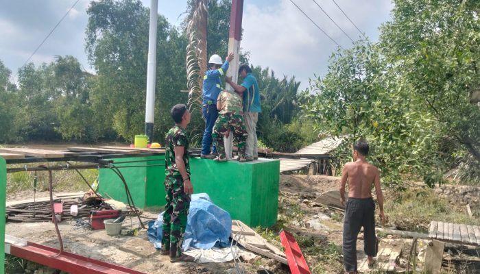 Progres Pembangunan Jembatan Perintis Garuda di Kuala Muda Kecil Terus Dipacu, Personel Kodim 0314/Inhil dan Warga Gotong Royong